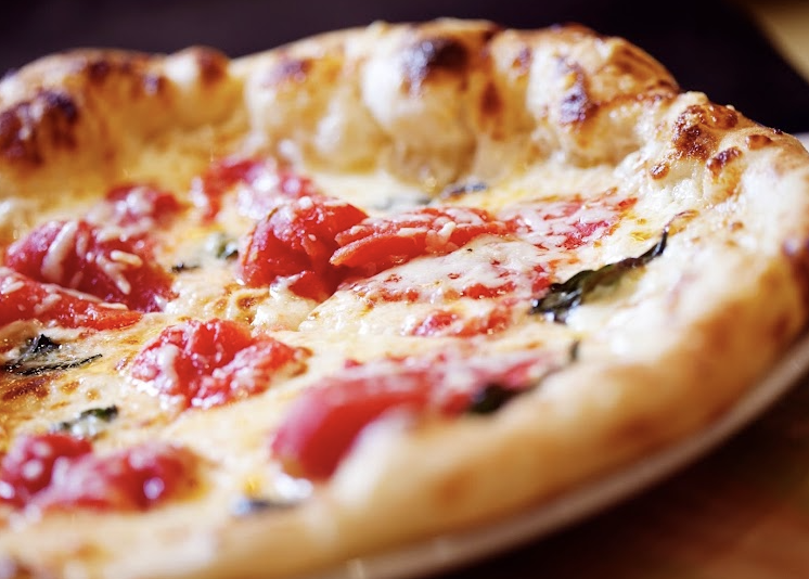 One Midtown Kitchen signature dishes Wood-Fired Pizzas
Seared Scallops
Pork Chop
